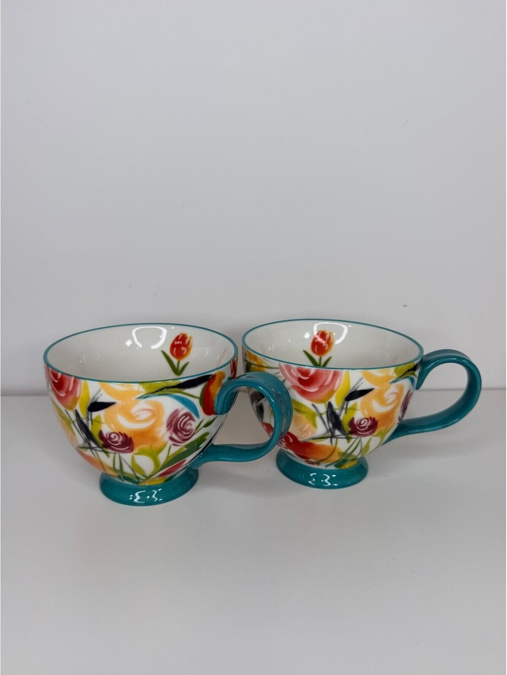 Floral footed mugs set of 2 with teal handles